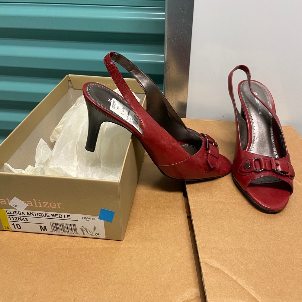 Red leather sling back pumps.